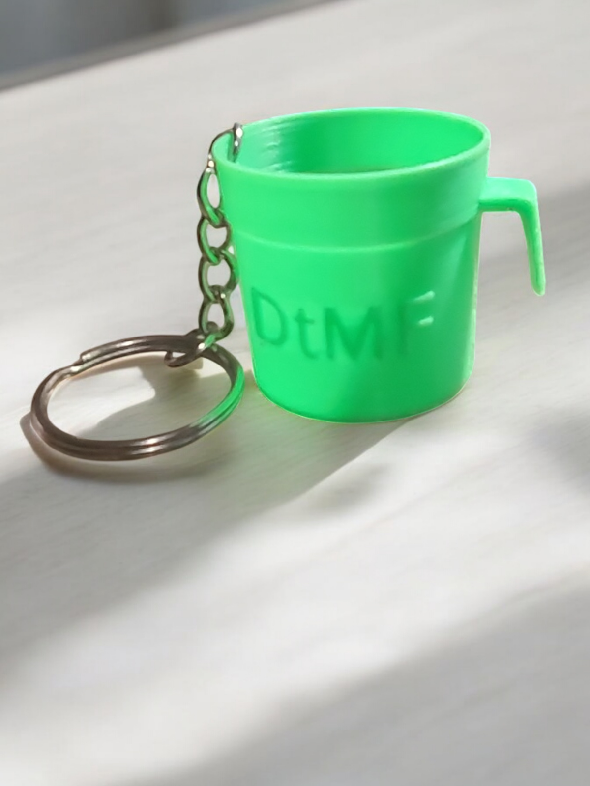 Bad Bunny DtMF Video Coffee Cup Keychain